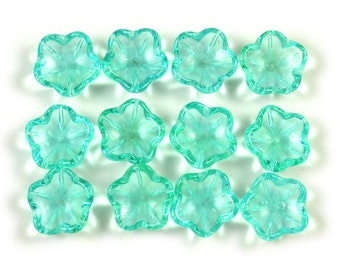 Bright UV active Blue Green transparent 14mm round cup flower beads. Last ones. Set of 12.