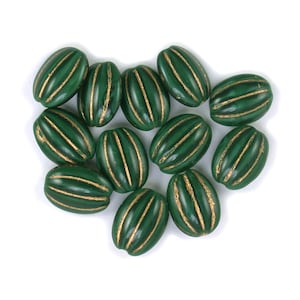 Dark Green opaque w/ Gold decor 12 x 9 x 4mm smaller flat oval beads. Set of 12, 13 or 25. image 1