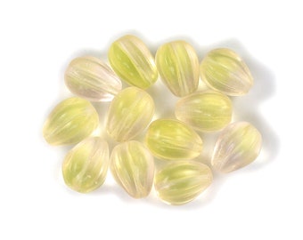 Pale Rose Uranium Yellow transparent 11 x 9mm fluted drop bead. Drilled lengthwise. Set of 12 or 25.