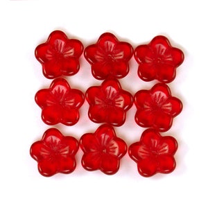 Red transparent glass center drilled 16mm flowers. Set of 12.