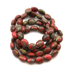 Red opaque w/ Brown picasso 12 x 10mm oval pebble beads. Set of 8, 15 or 30.