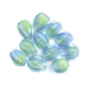 Pale Blue Uranium Yellow transparent 11 x 9mm fluted drop bead. Drilled lengthwise. Set of 12 or 25.