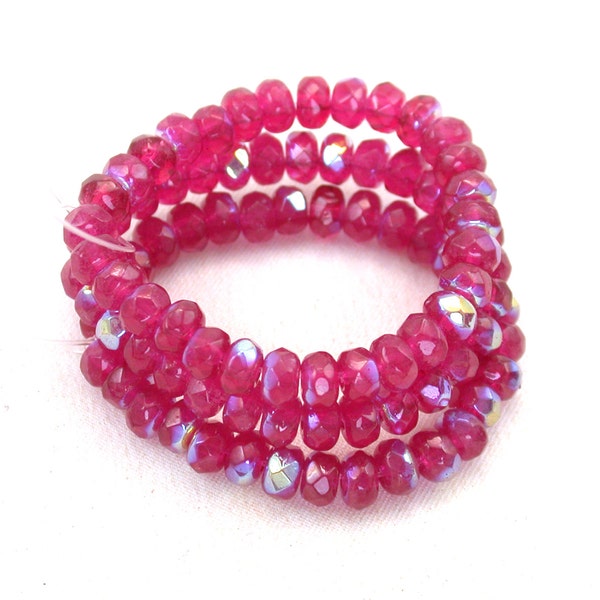 Fuchsia Pink opaline w/ Aurora Borealis finish 3 x 5mm rondelles. Set of 30 or 60.