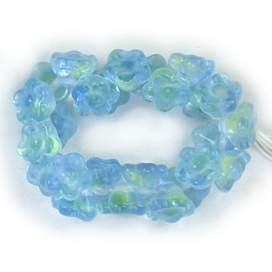 Light Blue UV active Yellow transparent 7mm button flower bead. Set of 25 or 50.