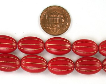 Red opaque w/ Gold decor 17 x 11 x 4mm larger flat oval beads. Set of 10.