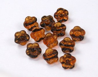 Perle boutonnée marron transparente à rayures noires de 8 mm. Lot de 25.