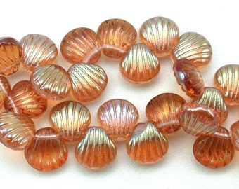 Rose celsian finish transparent 9mm scallop shell bead. Set of 12 or 25.