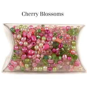 Glaspärlmixer Grupp 1 av 4: Säsongsblandningar. En behållare med glaspärlmix. Cherry Blossoms