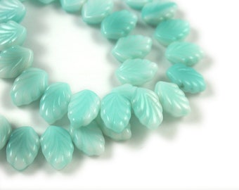 UV active Aqua transparent glaze White opaque 12 x 8mm carved fan leaf beads. Set of 15.