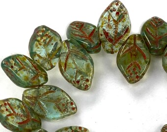 Aqua transparent w/ Brown picasso Red vein details 7 x 12mm leaf beads. Set of 12 or 25.