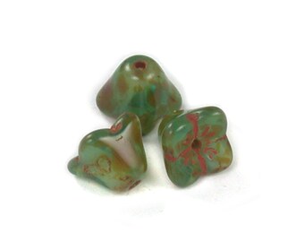 UV Active Medium Green transparent White givre w/ picasso four point 6 x 9mm bell flowers. Set of 12 or 25.