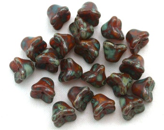 Reddish Brown opaline w/ picasso 6 x 9mm four point bell flowers. Set of 12, 25 or 50.
