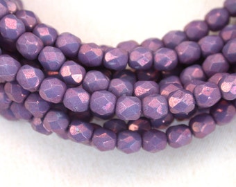 Purple opaque w/ Pink luster 4mm firepolished rounds. Set of 50 or 100.