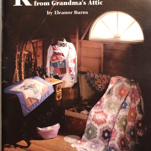 May include: A book cover titled Recycled Treasures from Grandma's Attic by Eleanor Burns from the Quilt in a Day series. The cover features a patchwork vest, a floral quilt, and a sewing machine in a wooden attic setting with a window.
