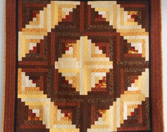 Log Cabin Quilt. Diamond design. Log cabin quilt wall hanging. Coverlet quilt. Quilted wall hanging. Brown and gold colors.  Size 61" x 61".