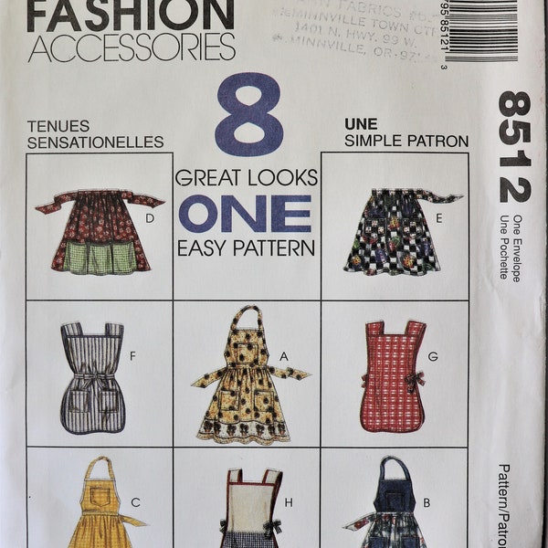 McCall's 8512.  Misses aprons pattern.  Pinafore aprons.  Full coverage aprons.  Half aprons pattern. Bib apron pattern. SZ S-L. Uncut.