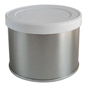 May include: A cylindrical container with a brushed metal finish and a white plastic lid. The container is round and has a simple, clean design. The lid fits snugly on top, creating a sealed appearance. The container is suitable for storage.