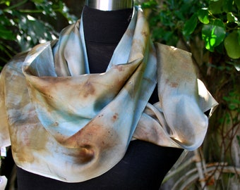 This luxury eco printed 100% habatoi silk scarf is a tribute to the beauty of nature.