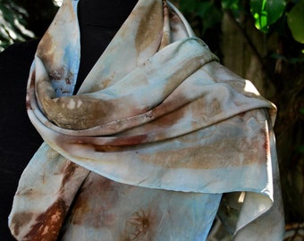 This luxury eco printed crepe de chine scarf is a tribute to the beauty of nature. Gorgeous drape