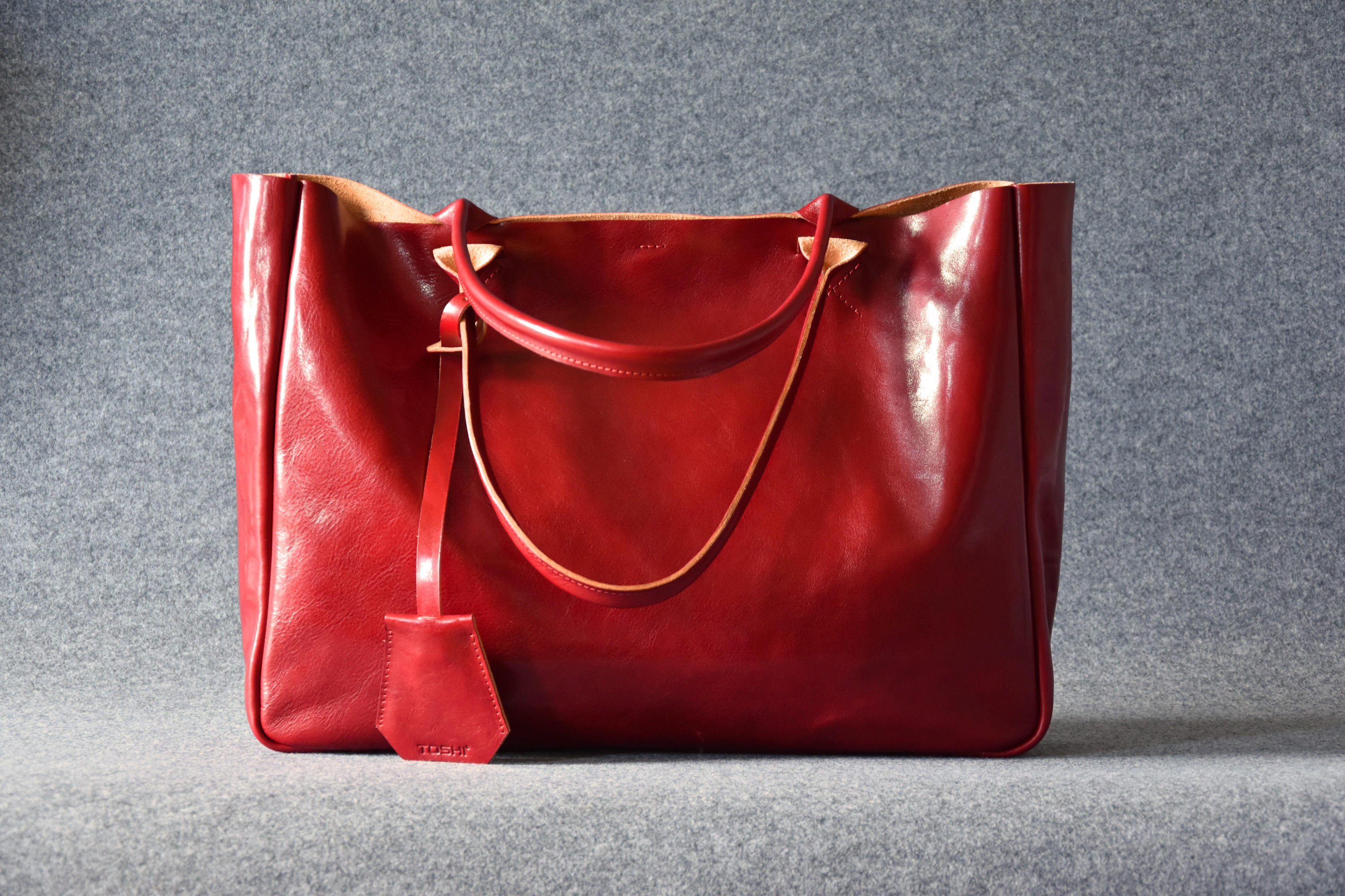 red leather bag