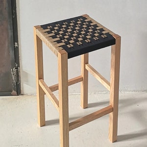 Handmade high wooden and rope stool
