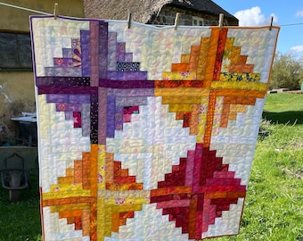 Hübscher Patchwork Quilt in leuchtenden und kräftigen Farben