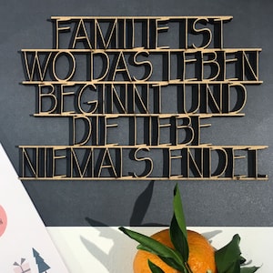 La famiglia è dove la vita inizia e l'amore non finisce mai: scritta decorativa in legno