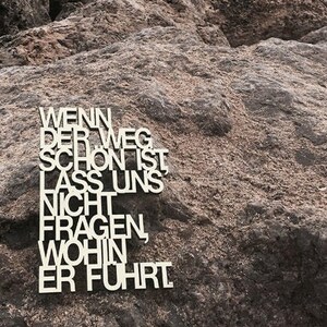 If the path is beautiful,..." Decorative wooden lettering