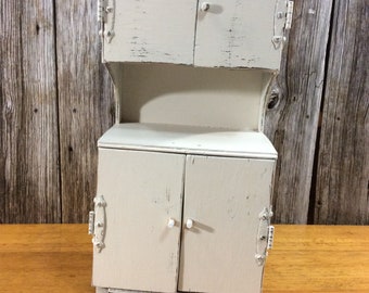 toy kitchen cupboard