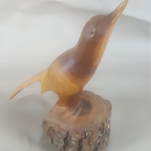 Vintage hand carved bird with live edge base