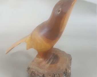 Vintage hand carved bird with live edge base