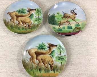 3 vintage Artmark hand painted deer plates