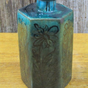 Cool vintage hexagon dark green vase with black flowers