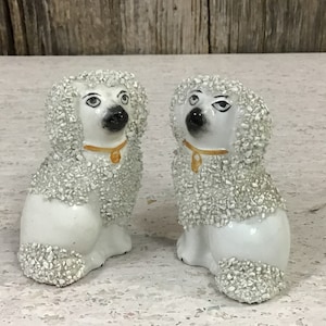 Matched pair miniature Staffordshire Ware confetti poodles