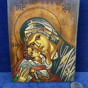 Vintage Madonna and Child painted on wood from Greece