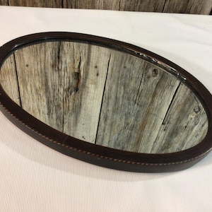 Edwardian oval mirror with inlay marquetry details