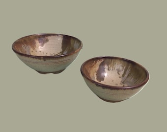 2 nested pottery bowls