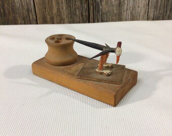 Charming vintage folk art pencil holder with bobbing bird