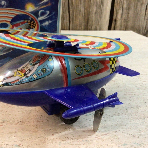 Vintage wind up Space Ship toy with box