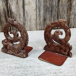 Pair antique Medieval Dolphin bookends