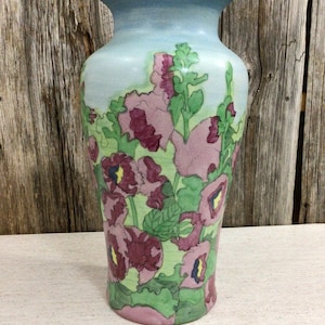 Large vintage ceramic vase with hollyhocks