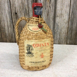Very nice 1959 Quinta rattan covered wine bottle