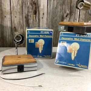 NOS 2 chrome and oak sconces with outlets