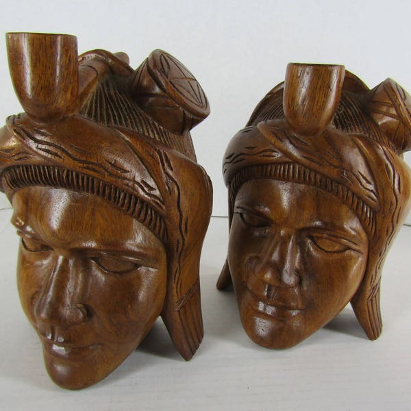 Pair of mid century carved ethnic head bookends
