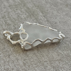 White sea glass and sterling silver pendant