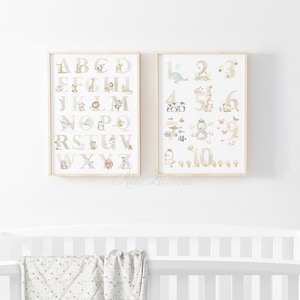 May include: Two framed prints with a white background. The left print features the alphabet with a different animal illustration for each letter. The right print features the numbers 1-10 with a different animal illustration for each number.