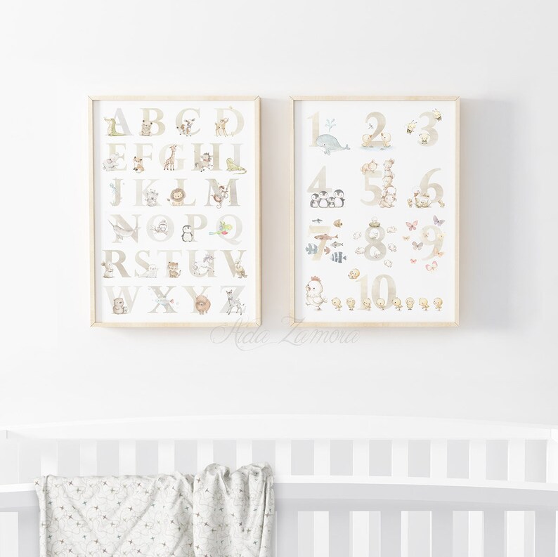 May include: Two framed prints with a white background. The left print features the alphabet with a different animal illustration for each letter. The right print features the numbers 1-10 with a different animal illustration for each number.