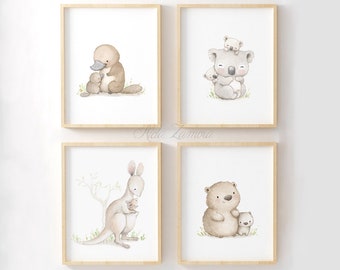 May include: Set of four watercolor illustrations featuring Australian animals with their babies. The illustrations are framed in light wood frames and feature a koala, kangaroo, platypus, and wombat.