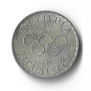 May include: A silver coin featuring the Olympic rings and the text "OLYMPIA XV HELSINKI 1952". The coin has a textured edge and is set against a white background. The design commemorates the 1952 Helsinki Olympics.