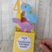 Handmade 3d pop up box greeting card. Dinosaurs theme. Great children's birthday cards. Any name and number added 